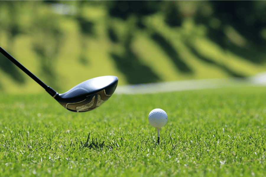 Golf Club with Golf Ball on Tee
