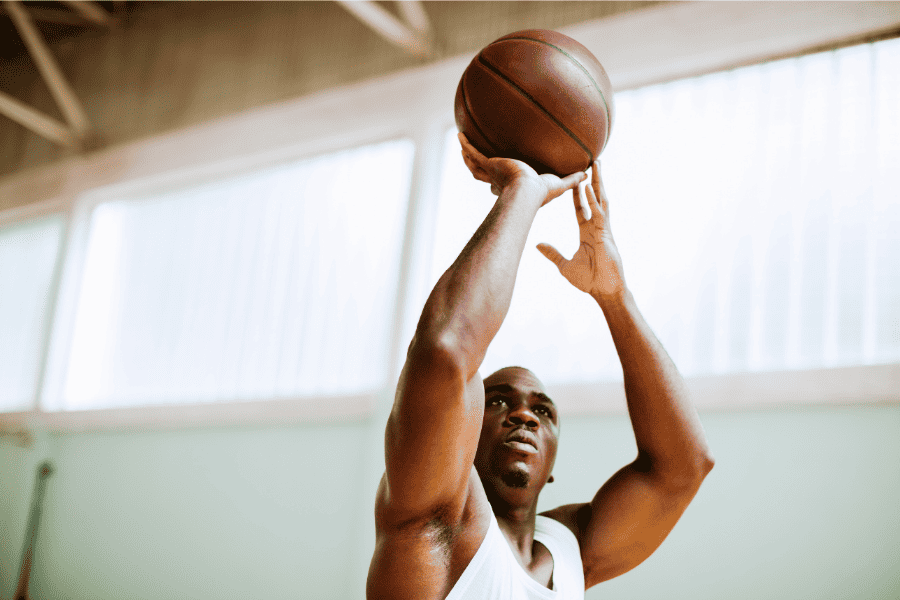 Basketball Player Shooting Ball